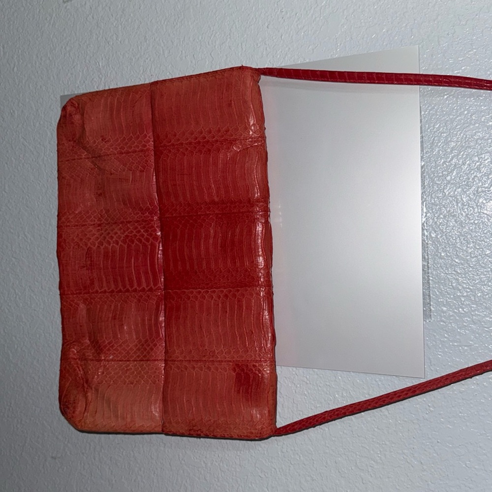 Discoloration on vintage luxury red bag